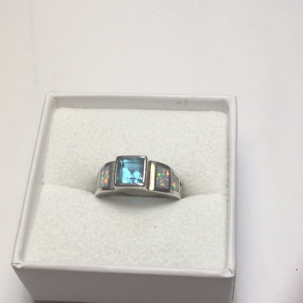 Blue topaz and opal ring